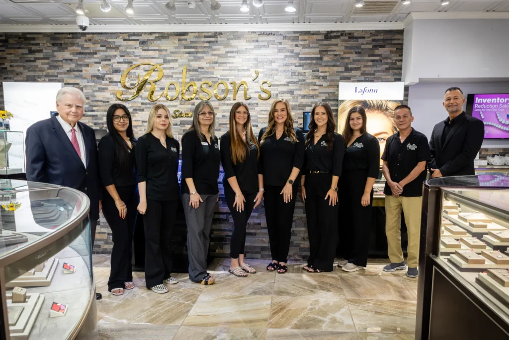 Robson's Jewelry team photographed inside their jewelry showroom