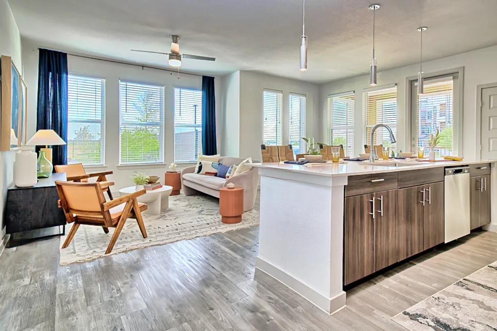 Bright interior photo of an open living and kitchen space with modern furnishings